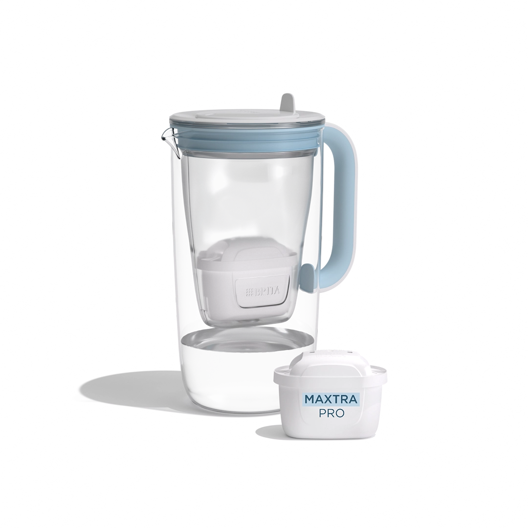 A water filter glass jug in blue on a white background