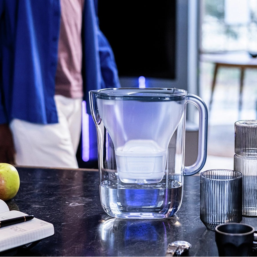 BRITA water filter jug Style Essential in blue on kitchen counter.