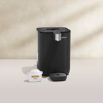 BRITA YOURCE mini in black on a beige background